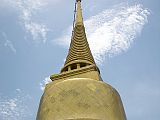 Bangkok 02 08 Wat Saket Golden Mount Chedi Wat Saket (The Golden Mount) is an artificial 100m hill, topped by a golden chedi. Rama V built the golden chedi to house a relic of Buddha, which sits atop the chedi. It was found at the ancient town of Kapilavastu in 1898, and presented to the King by the then British Raj government of India. The inscription was believed to be dated back to the pre-Asokan period.